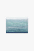 Tapis de bain touffeté avec texture dégradée bleu océan lavable pour la salle de bain
